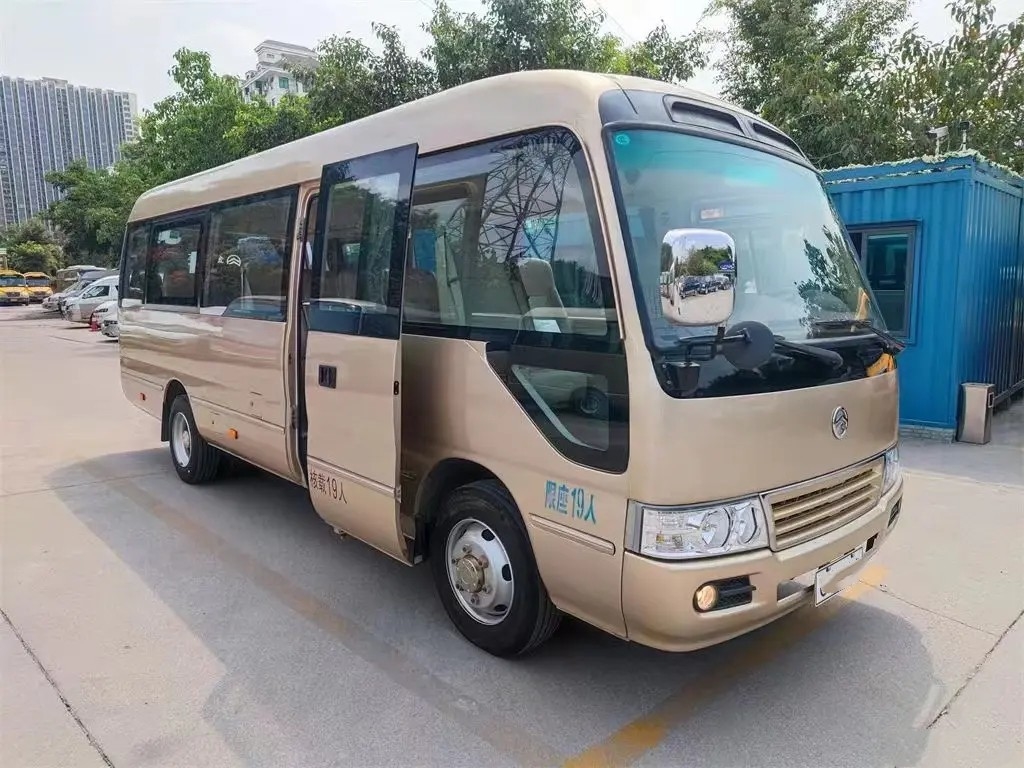 Second Hand Mini Bus Front Engine 19 Seats Golden Dragon Coaster External Swinging Door XML6700