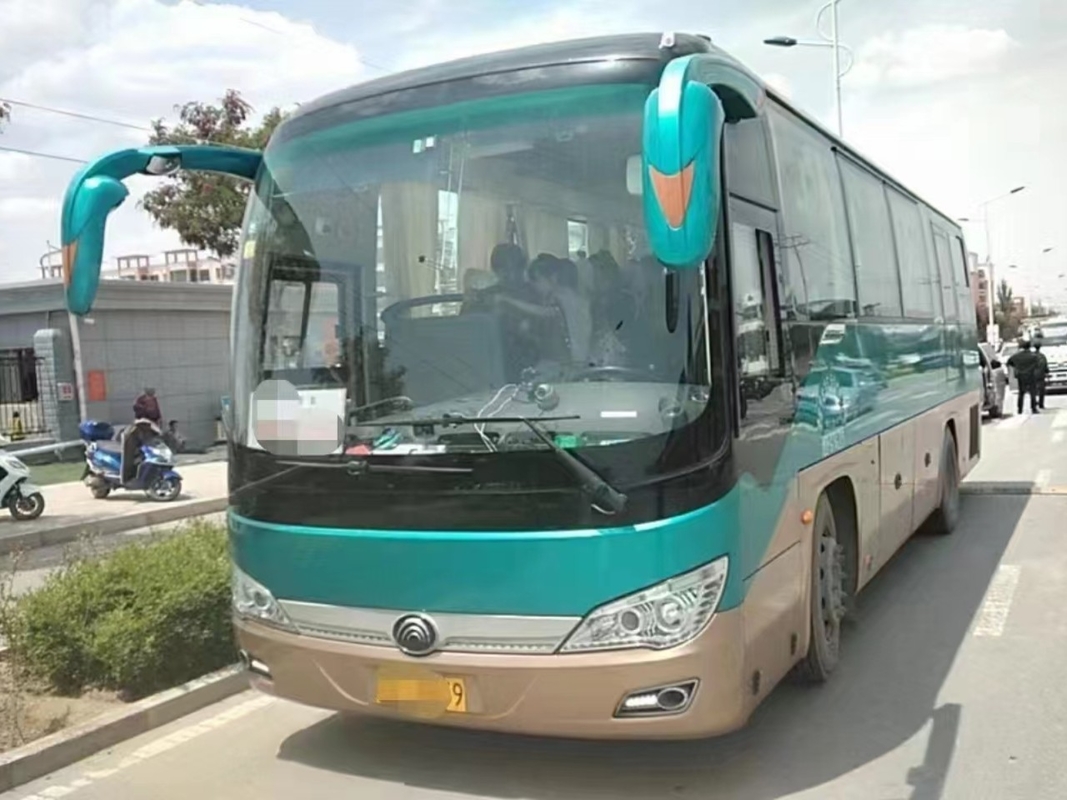 Used Motor Coaches Green Color 36 Seats Middle Passenger Door Air Conditioner 2nd Hand Yutong Bus ZK6906