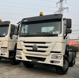 Used Diesel Trucks White Color 6×4 Drive Model Weichai Engine 430hp 12 Gears Standard Cabin Howo Tractor