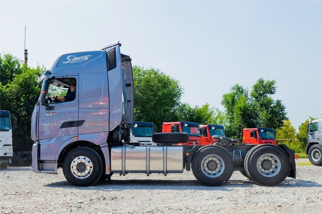 HOWO TH7 Truck 610HP 6*4 AMT Automatic Dangerous Goods Tractor Truck High Roof Deflector