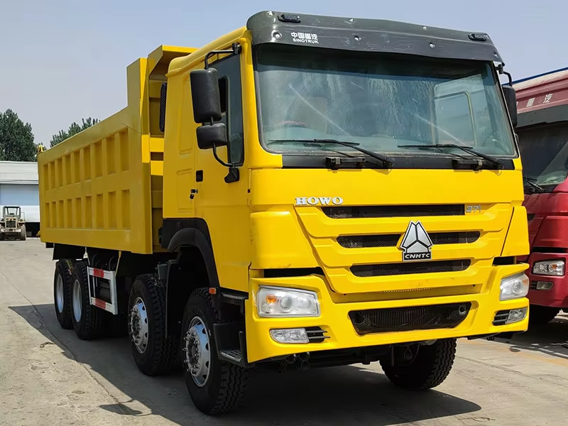 Used Howo Dump Truck 371hp 8x4 Left Hand Drive Diesel WP Engine AC 12 Wheels for Zimbabwe