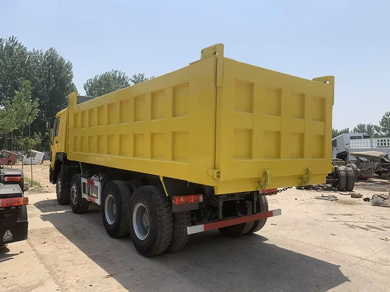 Used Howo Dump Truck 371hp 8x4 Left Hand Drive Diesel WP Engine AC 12 Wheels for Zimbabwe