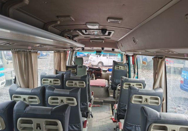 Used Commercial Bus With Luxury Coaster Bus 22 Seats 2640mm Height 4085mm Wheel Base