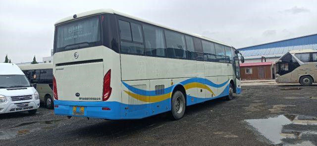 Used Tour Bus For Africa Used Golden Dragon Bus Yuchai Rear Engine 233kw 53seats Euro IV Airbag Chassis Low Kilometer